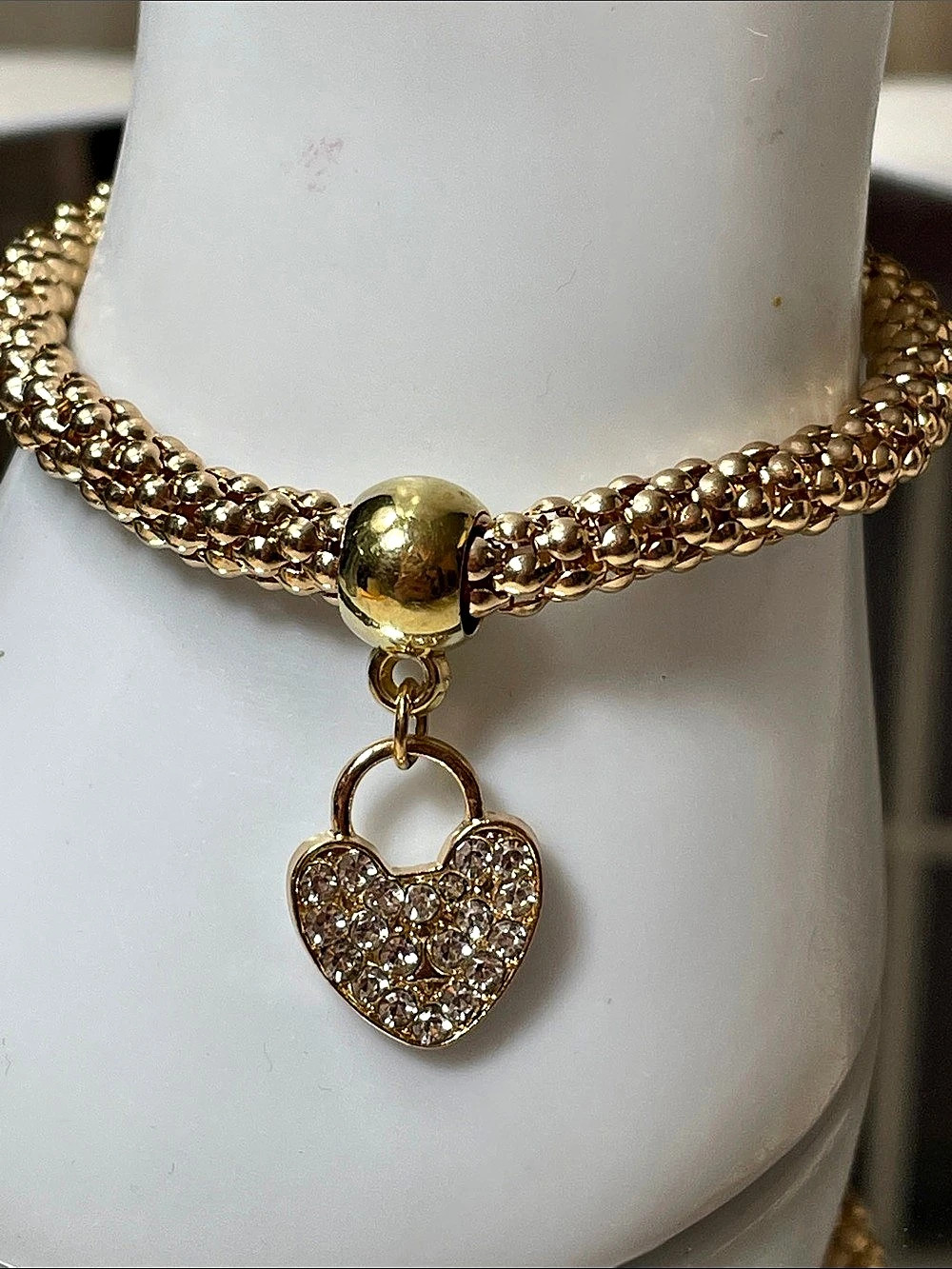 Gold-Tone Heart Charm Stretch Bracelet Adorned with Rhinestones Size 7” to 7.5”